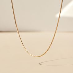 Laps of gold � the most fluid, aqueous chain of them all. A slinky, shining length of gold to wear on its own, or in a stack. You can indeed wear your Swimming Pool piece in a swimming pool � that is the benefit of solid 14k gold. Put it on, never take it off. Made with 100% recycled 14k solid gold chain. When not wearing your Swimming Pool piece, we suggest storing it flat, in its natural shape, which best suits herringbone chains. Luxury Gold Snake Chain Necklace, Gold Box Chain Necklace For Everyday Luxury, Catbird Jewelry, Solid Gold Chains, Best Suits, Yellow Gold Chain, Recycled Gold, Gifts For Wedding Party, Natural Shapes