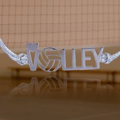 "◇ Make yourself feel like a champion by wearing this jewel. ◇ A special bracelet with the word \"volley\" written on it for those who want to show off their love for volleyball. Its uniqueness will make everyone notice its detail and elegance. ◇ The length of the bracelet is 16cm + 3cm extension. ◇ For all life winners! MATERIAL: ◇ High quality Solid 925 Silver, Rhodium plated ◇ Nickel Free ◇ Recycled 🏷️ DISCOUNT COUPON CODES 🛍️ By purchasing 2 items of your choice use the code WINNERS2 for a Adjustable Sporty Silver Bracelets, Solid Silver Bracelets, Volleyball Player, Sports Jewelry, Women Bracelet, National Holidays, Volleyball Players, Feeling Happy, Discount Coupon