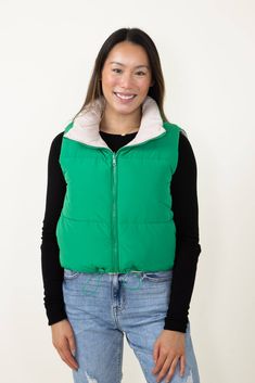 Look your best without sacrificing comfort in this Love Tree Cropped Reversible Puffer Vest for Women in Green/Beige. This reversible vest features a cropped fit for a modern look that's perfect for any occasion. The green and beige colors will make a great addition to your wardrobe. Enjoy the ultimate in fashionable warmth and comfort! Features: Love Tree Style: 5070VY-KELLY Color: Green and Beige 100% Polyester Women’s vest Reversible Center front zipper Puffer design Cropped fit Adjustable wa Trendy Nylon Spring Vest, Trendy Nylon Vest For Spring, Trendy Spring Nylon Vest, Green Vest Outerwear For Layering, Trendy Winter Vest For Everyday Wear, Green Layering Vest Outerwear, Green Puffy Vest Outfits For Women, Trendy Green Vest Outerwear, Green Cotton Winter Vest