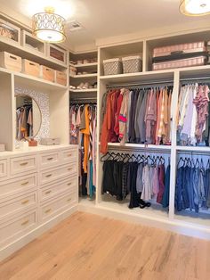 the closet is full of clothes and other things to wear in it's storage area