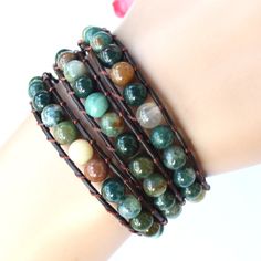 Product Material: Natural Agate Stone Beads,Leather cord 2 Wrap bracelet length: 34 cm/13.3 inches 3 wrap bracelet length: 58cm/22.3 inches 5 wrap bracelet length: 85 cm / 33 inches Product style: Classic/fashion/popular/Vintage/Bohemian/Charming METAL - stainless steel button, usually wrap up to2. 3 or 5 times (depending on your wrist size), adjustable silver color closure with 3 loops. each bracelet is similar as picture with high quality, but every piece is unique, due to the handmade item. B Adjustable Hand Wrapped Leather Bracelet With Round Beads, Adjustable Hand-wrapped Beaded Leather Bracelet, Adjustable Wrap Bracelet With 108 Beads For Healing, Leather Bracelet With Colorful Round Beads For Gift, Hand Wrapped Friendship Bracelet With Round Beads, Beaded Leather Bracelet With Round Beads As Gift, Adjustable Leather Bracelet With Round Beads As Gift, Adjustable Wrap Bracelet With 108 Beads For Meditation, Adjustable Leather Bracelet With Round Beads For Gift