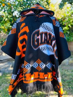 Handcrafted alpaca poncho unisex with hoodie and adjustable strings thick fabric warm and comfortable.  SF Giants Cozy Hooded Poncho For Outdoor, Alpaca Poncho, Poncho Design, Sf Giants, Merch Ideas, Thick Fabric, From Santa, Alpaca Wool, San Francisco Giants