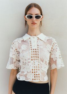 Embroidered blouse with openwork details Fitted Floral Embroidery Top With Collared Neckline, Spring Party Tops With Collared Neckline, Fitted Embroidered Top With Collared Neckline, Chic Collared Blouse With Floral Embroidery, Summer Sheer Collared Tops, Sheer Collared Top For Summer, Sheer Collared Summer Top, Chic Floral Embroidery Lace Top, Collared Lace Tops For Work