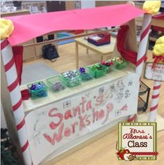 a santa's workshop display in the middle of a classroom