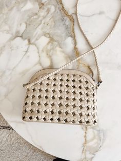 An oh-so-chic day bag (and the one our founder wears daily!). In a buttery soft, knotted woven leather with an arched top shape. Don’t be fooled by the size, Carmen is surprisingly roomy. Wear it long on your shoulder, crossbody, or tie the long strap into a knot and watch it transform into something new. The Woven Crossbody Strap and Adjustable Crossbody Strap are included with the Carmen Bag. Make it a shoulder bag with the Woven Shoulder Strap. Chic Evening Shoulder Bag With Interwoven Design, Chic Natural Shoulder Bag With Intrecciato Weave, Chic Natural Soft Leather Shoulder Bag, Chic Everyday Shoulder Bag With Interwoven Design, Chic Shoulder Bag With Interwoven Design For Everyday, Chic Shoulder Bag With Interwoven Design, Elegant Everyday Shoulder Bag With Interwoven Design, Chic Daily Use Bags With Interwoven Design, Chic Intrecciato Crossbody Shoulder Bag