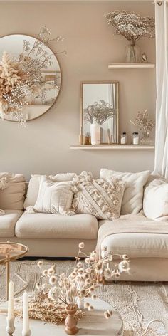 a living room filled with lots of furniture and decor on top of a white rug