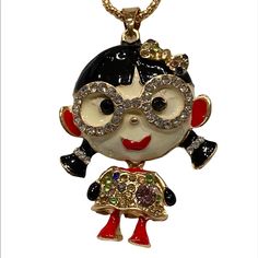 Brand New Adorable Little Girl W/Glasses Long Necklace. Gold W/Enamel & Rhinestones, She Measures 2”L 1.5”W She Comes On A 28” Goldtone Chain W/2” Ext Her Head Is Hollow Inside To Lessen Weight. She Is Also Hinged So That Her Body Swivels. Comes Boxed Ready For Gifting! Free Gift W/Purchase! All Reasonable Offers Are Welcome. I Can’t Say Yes, If You Don’t Ask. Bundle 2 Or More Items For 10% Off. All Jewelry Items Are Brand New, Unless Stated Otherwise. Thanks For Looking Through My. Happy Poshin Adjustable Rhinestone Necklace For Gift, Adjustable Jeweled Rhinestone Necklace As Gift, Long Necklace Gold, Say Yes, Necklace Gold, Red Gold, Long Necklace, Free Gift, Womens Jewelry Necklace