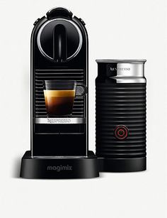 an espresso machine next to a can of coffee