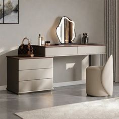 a modern dressing table with mirror, stool and handbag on the floor in an empty room