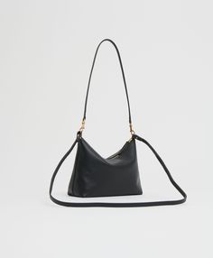 !!!Description---Our Hera Bag is lightweight and versatile, crafted from a delicate, supple lambskin leather that can be styled as a shoulder bag, crossbody, or clutch. !!!Fits---iPhone Max and smaller !!!Details---Width: 9.8in / 25cm Height: 5.5in / 14cm Depth: 1.2in 3cm – at the top 3.2in / 8cm – at the bottom Shoulder Strap: 11.5in / 29cm Crossbody Drop: 19in / 48cm Composition: 100% Italian Lambskin Leather Made in Italy !!!Materials---Our Italian lambskin is an ultra-smooth, buttery leather Versatile Crossbody Baguette Bag With Gold-tone Hardware, Evening Crossbody Hobo Bag With Adjustable Strap, Versatile Evening Crossbody Shoulder Bag, Versatile Evening Shoulder Bag With Double Handle, Versatile Double Handle Evening Shoulder Bag, Evening Crossbody Shoulder Bag With Removable Pouch, Versatile Evening Crossbody Bag, Versatile Evening Hobo Bag With Removable Pouch, Versatile Evening Hobo Bag With Adjustable Strap