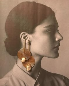 an image of a woman with earrings on her ear and the words dissove above it