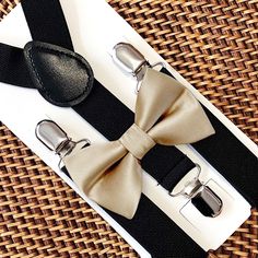 Your special guy will look so dashing when he shows up wearing this fine-looking champagne bow tie and black suspenders! Our champagne tie is a great choice for family photos, wedding, ring bearer outfit, birthday celebration or any other special occasion. ❤ **Please Specify**   Bow Tie Only (w/ Clip or Neck Strap), Suspenders Only, or Bow Tie Only & Susp (Bow Tie and Suspenders) SUSPENDERS- One Pair of our Quality Suspenders BOW TIE - One Bow Tie on White Adjustable STRAP or Alligator CLIP **CLIP ON Bow Ties are Recommended/Suitable for Children Only *Sizing: Please Check Measurements Before Ordering *Note: If your gentleman wears larger clothing for his age, we recommend going by the clothing size to be safe. Any other questions on this, please just ask!  Small: 6 months- 6 years Medium: Adjustable Green Bow Tie For Formal Occasions, Adjustable Green Tie For Party, Fitted Green Suit And Tie Accessories For Party, Green Fitted Suit And Tie Accessories For Party, Green Adjustable Tie For Party, Adjustable Green Ties For Party, Elegant Green Bow Tie For Father's Day, Adjustable Green Bow Tie And Accessories, Classic Adjustable Green Bow Tie