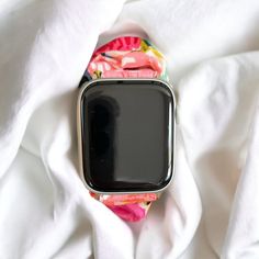 "Carefully constructed in California with authentic Rifle Paper Co Fabric. This Scrunchie Watchband for Apple Watches is fun and the perfect accessory to any wardrobe. These watch bands have an elastic design for comfort. Black Wildflower fabric band with rose gold connecter. Fits Apple watch size 38/40/41, or  Apple watch size 42/44/45. Size S fit wrists 5.2\"-6.3\" Size L fit wrists 6.3\"-7.5\" Please choose watch size and fit in the dropdown. Other sizes on upon request." Casual Apple Watch Band With Bracelet Strap, Adjustable Casual Apple Watch Band, Casual Adjustable Apple Watch Band, Casual Multicolor Apple Watch Band As Gift, Scrunchie Band Apple Watch, Apple Watch Scrunchie, Modern Pink Apple Watch Band For Gift, Pink Apple Watch Band, Fabric Christmas Stocking