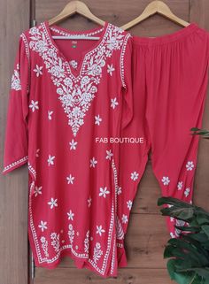 Description Material : Rayon Wash Care : Hand Washable Occasion : Casual Wear Touch and Feel - Comfortable and Soothing Sleeve-3/4 Sleeves PACKAGE CONTAINS: Kurti and Pant set Note : Motifs can be different following the Handwork by artisans Red Chikankari Embroidered Organza Sets, Red Cambric Sets With Chikankari Embroidery, Red Chikankari Kurta, Red Floor-length Chikankari Embroidery Kurta, Red Chikankari Embroidered Semi-stitched Palazzo Set, Sleeve Packaging, Kurta With Pants, Salwar Kameez, Dress Clothes For Women