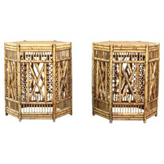 two small wooden baskets sitting next to each other on top of a white background,