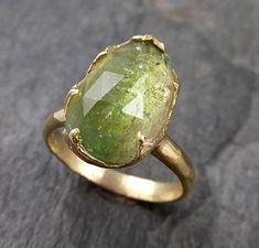 I created this setting in wax then cast it in recycled solid 18k gold at my home studio. This ring is a size 7 it can be sized. The stone is a green tourmaline. it measures about 15mm X 9.5mm I created a rustic texture in the gold. Throughout all time and history, in every tribe and culture all around the world crystals, minerals and gemstones have used for healing, luck, divination, adornment vibrational medicine and so much more. Tourmaline is a very balancing stone and helps heal and open the Gold Solitaire Engagement Ring, Pink Tourmaline Ring, Wedding Rings Solitaire, Gold Statement Ring, Ringe Gold, Wedding Rings Rose Gold, Gemstone Engagement, Popular Styles, 18k Gold Ring