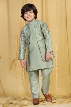 **Specifications : Please visit our brand store** https://www.etsy.com/in-en/shop/AJDezines?ref=seller-platform-mcnav .3 pc set: 1 Kurta, 1 Dhoti, Jacket .Sherwani: Cotton Silk regular fit, long sleeve Kurta. mandarin collar, front buttons. .Jacket: Raw Silk jacket, embellished with embroidery, round neck, comes with pocket. .Pajama: Straight fit Pajama made in raw silk with partially elasticated waist to best fit. A finely crafted 3 pc ethnic ensemble is a perfect combination of modern subtlety Kurta Pajama Design For Boys, Boys Sherwani Indian Weddings, Boys Party Wear Dress, Boys Indian Ethnic Wear, Boys Kurta Design Kids Indian, Boys Kurta Design Kids, Kids Kurta Pajama Boys, Boys Ethnic Wear Indian Kid, Kurta For Kids Boys