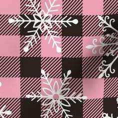 snow flakes on pink and black checkered fabric