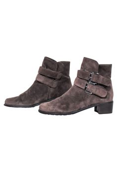 Boost your style game with Stuart Weitzman brown suede double buckle short Boots! The double side buckle detail adds a unique touch to these boho chic booties. Pair them with a dress and cozy cardigan for a stylish and comfortable look. Size 6 100% Suede Leather lining Rubber sole Double ankle buckles Low chunky heel Minto wear on suede Heel height 1.625" Shaft 5.5" Circumference 9.75" Fitted Ankle Boots With Buckle Closure, Fitted Boots With Buckle Closure For Spring, Spring Ankle Moto Boots With Buckle Closure, Brown Suede Boots With Buckle Closure, Brown Leather Boots With Buckle Closure For Spring, Winter Suede Moto Boots With Buckle Closure, Casual Suede Moto Boots With Buckle Closure, Brown Moto Boots With Buckle Closure For Spring, Elegant Moto Boots With Buckle Closure For Winter