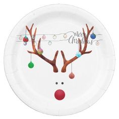 a paper plate with reindeer's head and ornaments on it