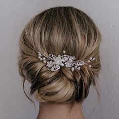 a woman with blonde hair wearing a wedding hairstyle