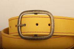 Our 100% Real Leather snap closure belts are handcrafted with lots of love right here in our studio, and the entire process is done by hand, and made to order. We use the finest full grain leather to produce our belts, and each one comes standard with a basic buckle. Please note: This is a handmade product made with natural materials so the color and finish may vary slightly from the image shown.Sizing:Please see our helpful size chart within the images of this listing. If you don't see your siz Vintage Leather Belt Buckles As Gift, Leather Belts With Antique Buckle For Gift, Artisan Handmade Leather Belt, Handmade Artisan Leather Belt, Adjustable Artisan Leather Belt Buckles, Rectangular Leather Belt Buckles For Everyday Use, Vintage Handmade Leather Belts, Handmade Vintage Leather Belt, Artisan Handmade Leather Belt Buckles