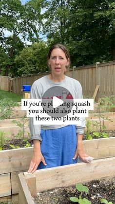 a woman standing in front of a garden bed with plants growing inside it and the words if you're pling squash, you should also also use plant these twoplants