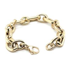 A stunning 14k yellow gold bracelet with large links that exudes timeless elegance and modern style. Its alternating oval and round links create a captivating design that catches the eye. Crafted with a hollow construction, this bracelet offers a big, bold look without the hefty weight, making it an excellent value for the money. The XL lobster clasp ensures a secure and convenient closure, making it easy to put on and take off. With a length of 7.5 inches, this bracelet is designed for a classi Modern Gold Chain Bracelet, Modern Gold Chain Link Bracelet, Modern Gold-tone Bracelet With Chunky Chain, Modern Gold Link Bracelet, Yellow Gold Bracelet With Chunky Oval Link Chain, Elegant Chain Bracelet With Chunky Oval Links, Modern Gold Jubilee Bracelet With Oval Links, Formal Yellow Gold Chunky Chain Bracelet, Luxury Oval Link Bracelets