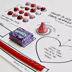 a valentine's day activity for kids with candy and marshmallows on the table