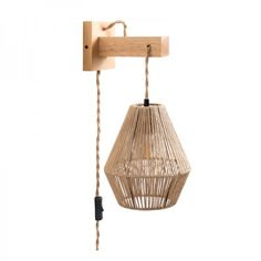 a wooden light hanging from the side of a wall