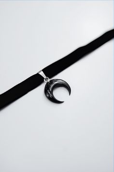 Black velvet choker with lunula moon pendant. Choker width 0 ²⁵/₆₄ "(1 cm) Moon height 0 ²⁵/₃₂ (2 cm) Please add your neck circumference to your order, so choker will surely fit you! Default length is 31 cm (12 ₆₄) + clasp and adjustment chain.  Please feel free to contact is if you have any questions! Follow us on Instagram: @moonphases.worldwide Cresent Moon Necklace, Moon Choker, Jewelry Goth, Goth Choker, Black Velvet Choker, Celestial Necklace, Pendant Choker, Witchy Jewelry, Velvet Choker