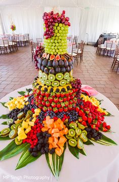 a wedding cake made out of fruits and vegetables