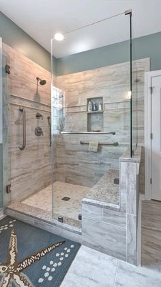 a bathroom with a walk in shower next to a sink