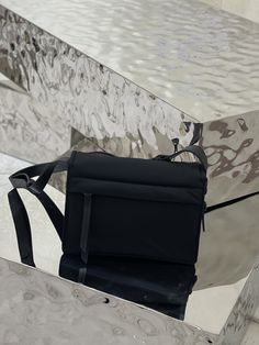 The concept of mixing and matching nylon shoulder bags runs through Prada's narrative language, interpreting creative designs through unique and interesting combinations of materials, silhouettes and functions. This clamshell shoulder bag is reinterpreted with Re-Nylon technology and innovative material, presenting a refined and feminine silhouette. The padding gives the bag a soft, modern look, and the adjustable leather shoulder strap makes it easy to carry it in a variety of ways.
Size: 16*11*23cm. Small Backpack Black, Prada Hobo, Prada Mini, Soft Modern, Lv Purse, Lv Shoes, Small Messenger Bag, Gold Handbags, Lv Handbags