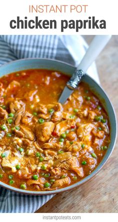 instant pot chicken paprika in a bowl with a spoon