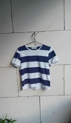 Vintage MARIMEKKO blue white striped short sleeve Cotton top Made in Finland Size: M . Sizing can vary, to be sure that you have chosen the right size, please take a look at our measurements below. Flat measurements (approx.): chest: 50 cm or 19,6" length: 53 cm or 21'' sleeve: 19 cm or 7,5" Material: 100% cotton  Condition: VINTAGE  GOOD Actual colors may vary. This is due to the fact that every monitor has a different capability to display colors and that everyone sees these colors differently Blue Short Sleeve T-shirt With Contrast Stripes, White T-shirt With Contrast Stripes For Summer, Summer Short Sleeve T-shirt With Striped Hem, Blue Striped Short Sleeve T-shirt, Blue Crew Neck Top With Vertical Stripes, White Contrast Stripes T-shirt For Summer, Blue Short Sleeve T-shirt With Three Stripes, Blue Vertical Stripes Short Sleeve Top, Blue Short Sleeve Top With Horizontal Stripes