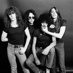 three women are posing for a black and white photo with their arms around each other