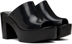 Melflex® PVC slip-on heeled sandals in black. · Open round toe · Logo embossed at outer sides · Logo printed at padded footbed · PVC block heel and platform midsole · Treaded rubber outsole · Platform: H1.5 in · Heel: H3.5 in Supplier color: Black Heeled Sandals, Luxury Streetwear, Block Heels, Designer Fashion, Sandals Heels, Slip On, Women Wear, Perfect Clothing, Sandals