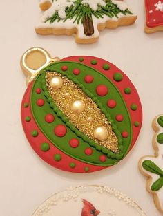 decorated cookies are displayed on a table