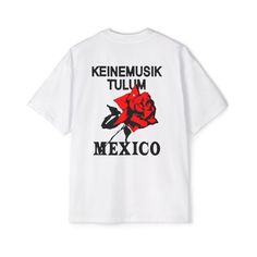 Introducing the Keinemusik Techno T-shirt, a must-have for any music enthusiast. Crafted with care, this standout piece features the renowned "Keinemusik" motif and the captivating "Mexico Rose" design. Made from high-quality, breathable cotton fabric, it ensures comfort while keeping you stylish. Available in a versatile white color, this t-shirt pairs effortlessly with any streetwear ensemble, making it a staple in your wardrobe. Designed for aficionados of house music and techno, this Keinemu Graphic Tee With Logo Print For Concert, Relaxed Fit Tops With Text Print For Music Festivals, Casual T-shirt With Logo Print For Concerts, Casual Tops With Logo Print For Music Festivals, Relaxed Fit Band Logo Tops For Music Festivals, Urban Screen Print Tops For Music Festivals, White Tops With Band Logo For Music Festivals, White Band Merch Tops For Music Festivals, Short Sleeve Tops For Music Festivals With Logo Print