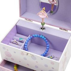 Jewelkeeper Music Boxes are perfect for storing and organizing your little girl's treasures. Our ballerina music box has two drawers with lavender lining, and plays the classic Swan Lake tune. Crafted with durable pine fiberboard and silver-tone latch, it meets safety guidelines. Packaged in a Gift Box, it's the ideal birthday gift for girls. Measures 6.75 x 5.25 x 6 inches (L x W x H). Shop Jewelkeeper Music Boxes and create memorable moments today! Ballerina Musical Jewelry Box, Ballerina Decor, Music Box Ballerina, Ballerina Jewelry Box, Kids Jewelry Box, Ballerina Jewelry, Dancer Gift, Girls Jewelry Box, Ballerina Doll