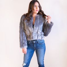 When Temperatures Get Chilly, This Faux Fur Jacket Adds Plenty Of Warmth And Personality To Your Day To Day Look. It's A Beautifully Chic Addition To Your Wardrobe And We Are Loving This Gray Color! Grey Silver Long Sleeve Outerwear For Fall, Silver Long Sleeve Outerwear For Spring, Silver Fitted Outerwear For Spring, Fitted Silver Long Sleeve Outerwear, Blue Winter Outerwear With Faux Fur Lining, Gray Faux Fur Outerwear For Winter, Purple Faux Fur Outerwear For Winter, Fitted Blue Faux Fur Outerwear, Purple Faux Fur Winter Outerwear