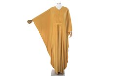 "●This loose maxi kaftan dress is a perfect oversize outfit for women, they love cosiness and comfortable feeling . ●Material: ITY polyester jersey ● Measurements: Fits until 5 XL Length: 59 inches /150 cm Bust: 64 inches / 164 cm ●Custom order are welcome ! ●Do you want the dress shorter? Just write at checkout a note for me in the section \"Note for seller\" about the!" Bohemian Oversized Maxi Dress, Oversized Bohemian Maxi Dress, Oversized Bohemian Maxi Abaya, Solid Bohemian Maxi Dress, Flowy Yellow Tunic Maxi Dress, Elegant Maxi Length Abaya For Vacation, Yellow Flowy Long Maxi Dress, Flowy Yellow Long Maxi Dress, Elegant Solid Color Maxi Length Kaftan