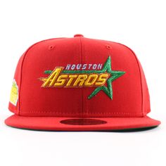 the houston astros snap back hat is red with green, yellow and orange stars on it