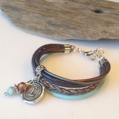 This gorgeous leather bracelet is perfect for every day wear! I have simplified my Popular triple wraps and condensed them down to one single wrap! The same great style and look yet simpler and more delicate! This bracelet is perfect for the woman who loves the rich leathers and colors of the Boho Wrap but not all the bulkiness! This gorgeous wrap is made with genuine braided leather, soft suede and quality round leather cord. Beautiful colors of Copper, Bronze, Blue and Grey! A charm and matchi Bohemian Leather Braided Bracelet As Gift, Bohemian Leather Bracelets For Everyday Wear, Brown Bohemian Leather Bracelet For Everyday Use, Bohemian Brown Leather Bracelet For Everyday Use, Brown Bohemian Leather Bracelet For Everyday, Bohemian Leather Bracelet For Everyday Wear, Bohemian Leather Bracelet For Everyday, Everyday Bohemian Nickel Free Wrap Bracelet, Handmade Bohemian Leather Bracelet For Everyday