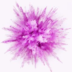 a purple colored substance is flying through the air