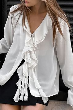 Details: Material: Polyester, Chiffon Style: Elegant Pattern Type: Solid Color Element: Ruffle Neckline: V Neck Sleeve Style: Flare Sleeve Sleeve Length: Long Sleeve Fit Type: Loose Clothing Length: Regular Type: Solid Color Size(in) Length Shoulder Width Bust Sleeve Length S 24.8 14.8 42.1 24.4 M 25.2 15.2 43.7 24.8 L 25.6 15.6 45.3 25.2 Tips:Due to the many variations in monitors, the color in the image could look slightly different, please take physical design and color shall prevail.Please a Elegant Ruffled V-neck Blouse, Elegant V-neck Ruffle Blouse, Feminine Chiffon Tops With Ruffles, Feminine Ruffled Chiffon Tops, Elegant Chiffon Blouse With Ruffles, Chic Chiffon Tie Neck Tops, Summer Chiffon Blouse With Ruffle Hem, Spring Chiffon Top With Ruffle Hem, Spring Chiffon Blouse With Tie Neck