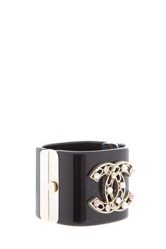 Chanel Black Cuff with Jewel Details; AS-Is Missing 2 stones.Opening: 2.25" x 2.1"Width: 2" Brand = Chanel Color = Black Condition = Gently Loved Item Number: 7650-30 Item ID: 168877 Category: Bracelet Chanel Cuff Bracelet, Chanel Cuff, Ysl Shoes, Black Jewel, Jimmy Choo Sunglasses, Burberry Sunglasses, Dior Sunglasses, Chanel Sunglasses, Chanel Jewelry