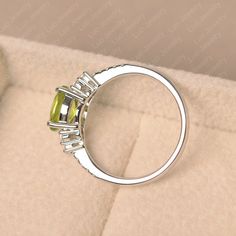 Elegant Lime Green Oval Rings, Oval Peridot Birthstone Ring For Anniversary, Lime Green Oval Rings With Accent Stones, Oval Peridot Ring In White Gold, Oval Lime Green Rings For Anniversary, Lime Green Oval Rings For Anniversary, Oval Lime Green Anniversary Ring, Blue Topaz Ring Sterling Silver, Wedding Ring White Gold