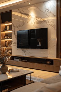 a living room filled with furniture and a flat screen tv mounted on a wall above a fireplace